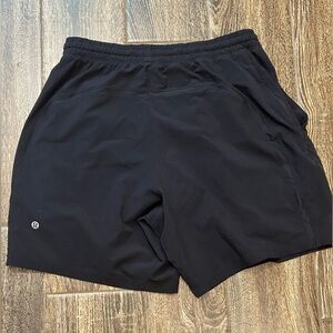 Medium Lululemon pace breaker 7 inch inseam black shorts. Unlined.